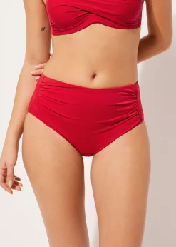 Figi z wysokim stanem modelujące dół od kostiumu Indonesia